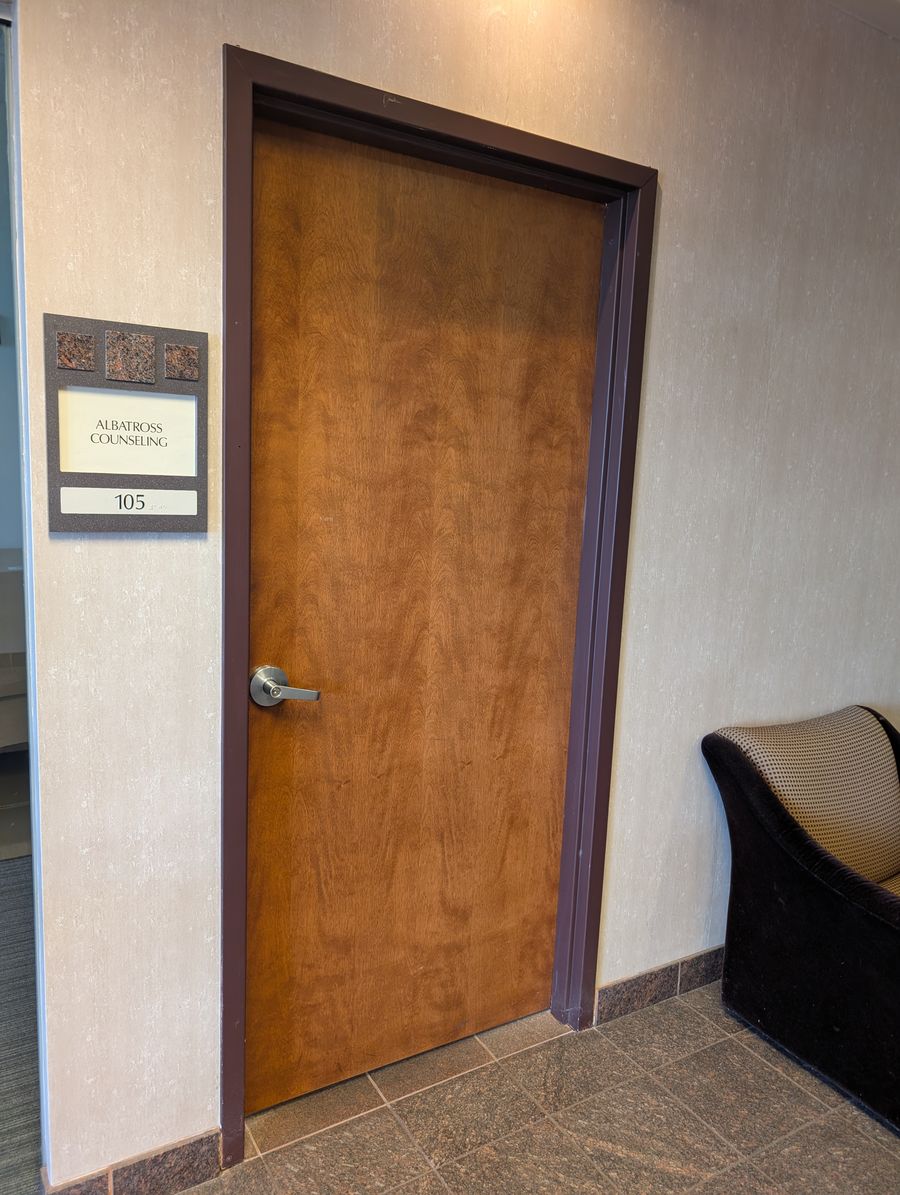 The door to Albatross Counseling, Suite 105